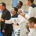 Skyline's head coach Mike Lovelace and the rest of the team cheer on their team mates a the end of their game against Ypsilanti Tuesday, Jan. 15.

Courtney Sacco I AnnArbor.com  